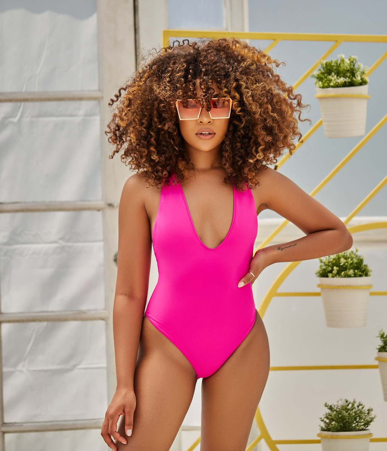Model Wearing Pink Swim Suit